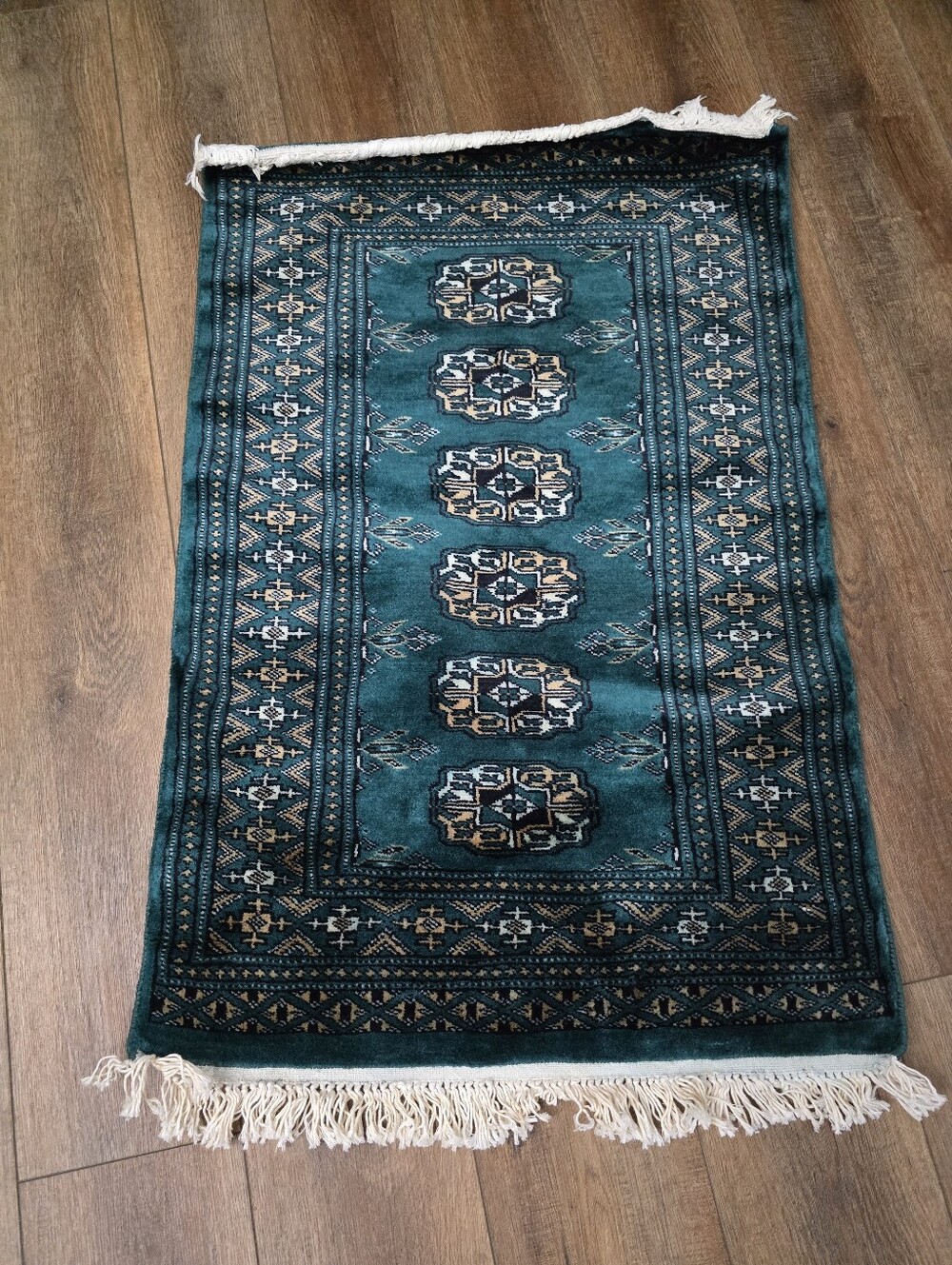 Pakastani Handmade Bokhara Rug Emerald Green "Elephant Foot" Design. Rolled.